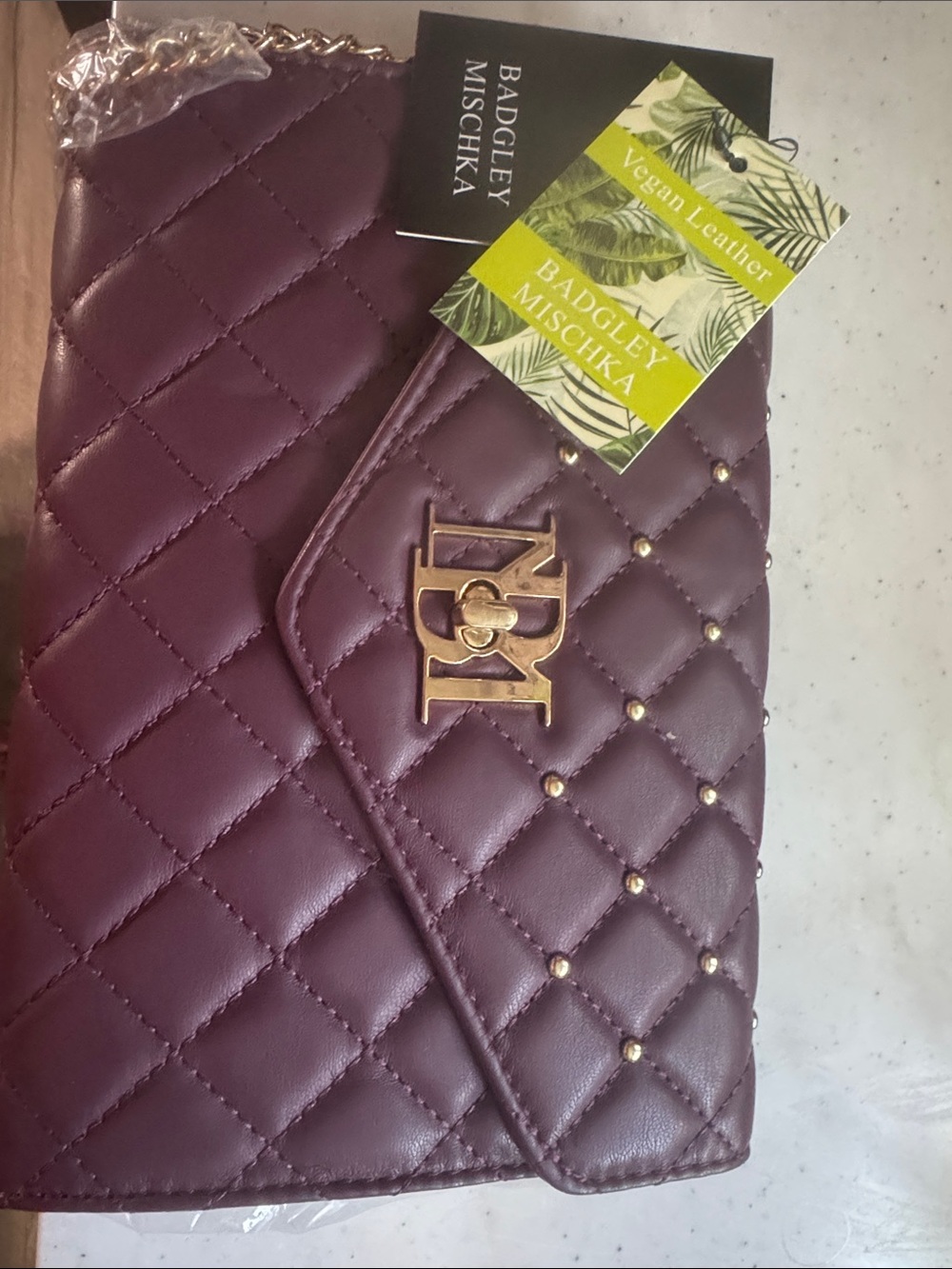 Badgley Mischka Quilted Plum Wristlet Clutch with Gold Hardware